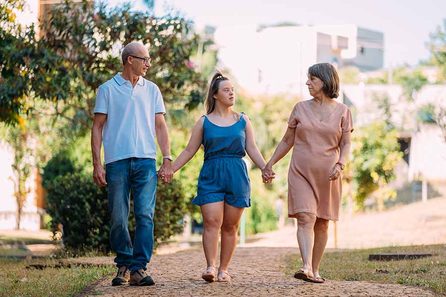 parents and child in park